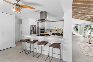 Located in the prestigious Seagate Country Club, this - photo 18