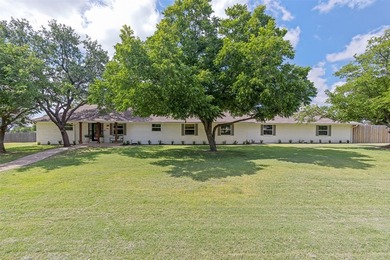 Nestled on a picturesque one-acre lot in the heart of Flower - photo 2