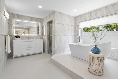 Located in the prestigious Seagate Country Club, this - photo 24