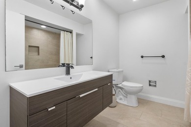 Located in the prestigious Seagate Country Club, this - photo 29