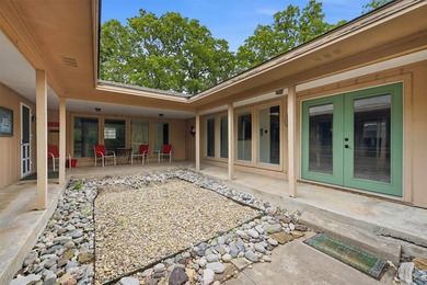 Tucked beneath the trees in the desirable Tanglewood community - photo 31