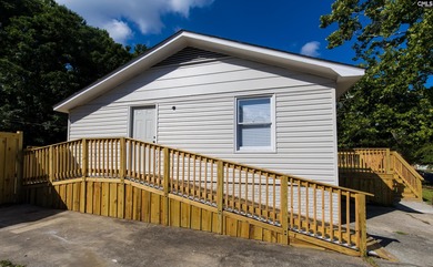 Discover this beautifully renovated and meticulously maintained