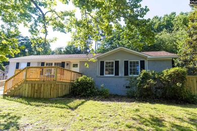 Discover this beautifully renovated and meticulously maintained