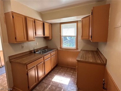 Welcome to this charming bungalow in the heart of Euclid. This - photo 8