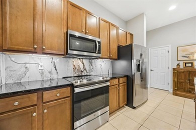 Don't miss this meticulously maintained 4 bed/2 bath Amelia Walk - photo 10