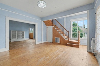 * FIXER * Large, 7,000+ sq. ft. corner lot with paved concrete - photo 4