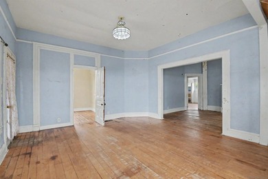 * FIXER * Large, 7,000+ sq. ft. corner lot with paved concrete - photo 5