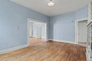 * FIXER * Large, 7,000+ sq. ft. corner lot with paved concrete - photo 8
