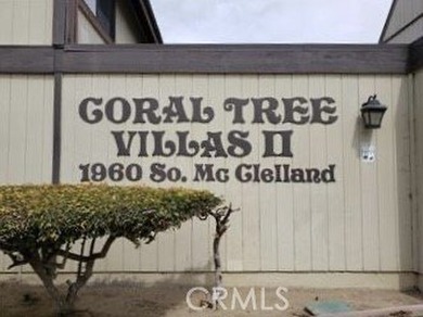 This 2-story condo offers comfortable living in the gated Coral - photo 1