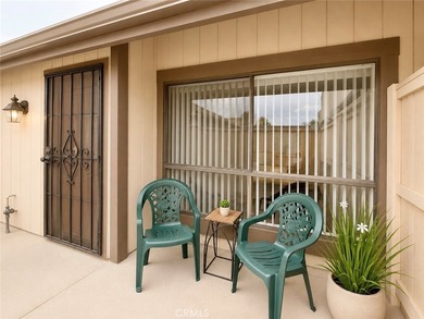 This 2-story condo offers comfortable living in the gated Coral - photo 3