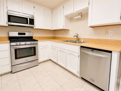 This 2-story condo offers comfortable living in the gated Coral - photo 9