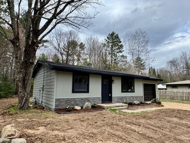 Newly renovated year-round cottage on the Eagle River Chain of - photo 2