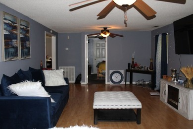 This property sits on a cover lot. The house has vinyl siding, 1