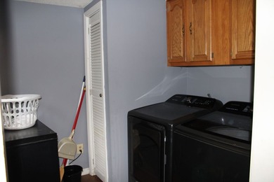 This property sits on a cover lot. The house has vinyl siding, 1