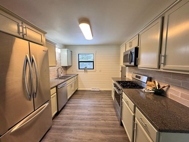 Newly renovated year-round cottage on the Eagle River Chain of - photo 5