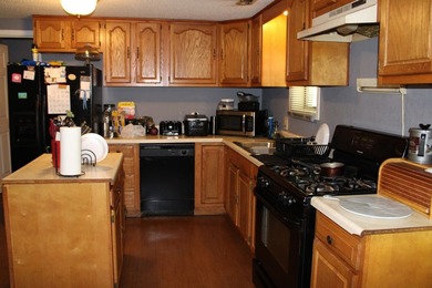 This property sits on a cover lot. The house has vinyl siding, 1