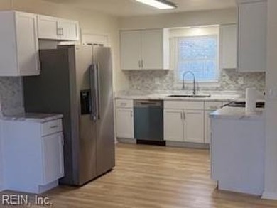 Beautifully and fully remodeled ranch-style home offered by the