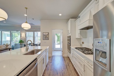 Welcome to this stunning Charleston single-style home in The - photo 7