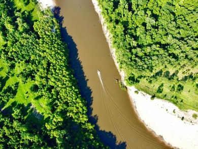 This diverse riverfront property is a rare find. Located between - photo 2