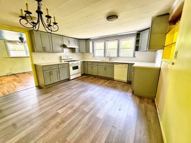 This centrally located home is ideal as a first purchase or