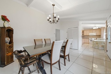 Lovingly maintained three bedroom home featuring an upgraded - photo 5