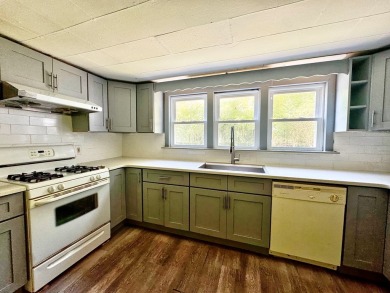 This centrally located home is ideal as a first purchase or