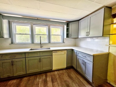 This centrally located home is ideal as a first purchase or