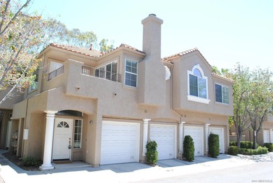This upper unit in the highly sought after Belsera Community of - photo 1