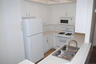This upper unit in the highly sought after Belsera Community of - photo 5