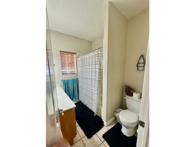 Welcome to this beautifully maintained all-brick lakefront home - photo 18