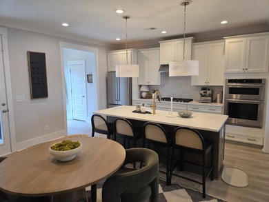 Welcome to this stunning Craftsman-inspired home in the highly - photo 7
