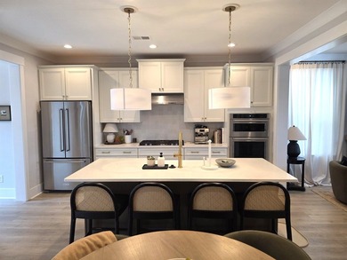 Welcome to this stunning Craftsman-inspired home in the highly - photo 9