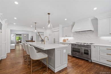 Beautifully renovated and impeccably maintained, this - photo 8
