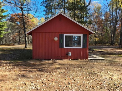 Nestled in the serene beauty of St. Germain, WI, this enchanting - photo 3
