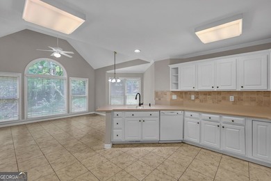 Welcome home to this beautifully maintained 3-sided brick ranch - photo 17