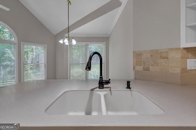 Welcome home to this beautifully maintained 3-sided brick ranch - photo 18