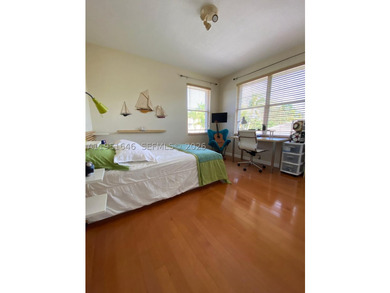 Located in the prestigious Weston Hills Country Club, this - photo 22