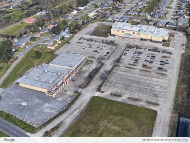 This retail listing is for the former Furniture Place building