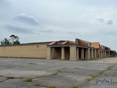 This retail listing is for the former Furniture Place building