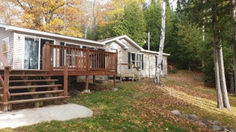 Lower Barnhart Lake Home For Sale in Millersburg Michigan