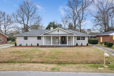 This wonderful renovated, turnkey home features 5 spacious - photo 1
