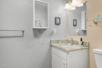 Enjoy easy coastal living in this beautifully maintained - photo 16