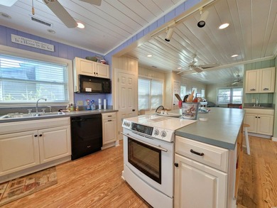 Experience nearly a century of coastal charm in this magnificent - photo 8