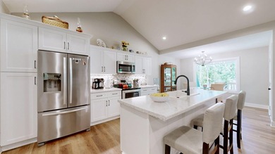 Waterfront living at an accessible price in this nearly new home - photo 3