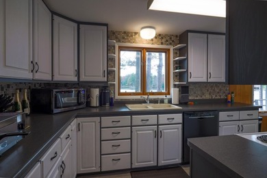Highly sought-after Tomahawk Lake property featuring a 4BR, 2BA - photo 3