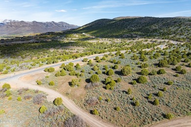 Set within the prestigious Uinta Ridge neighborhood of Red - photo 11