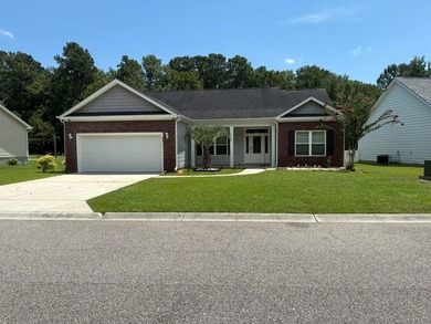 Beautiful open floorplan house with view of pond in backyard - photo 1