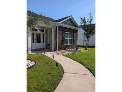 Beautiful open floorplan house with view of pond in backyard - photo 4