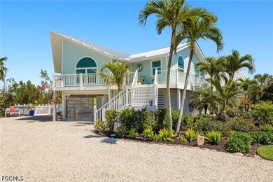A seamless blend of coastal charm and modern luxury, this fully - photo 1