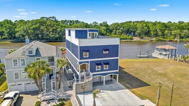 Experience the ultimate waterfront lifestyle in this stunning - photo 2